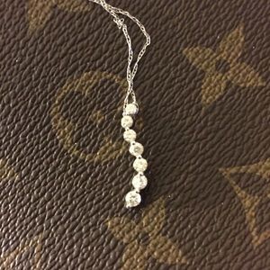 TRADED 10K W/GOLD & 7 REAL DIAMONDS PENDANT W/14K